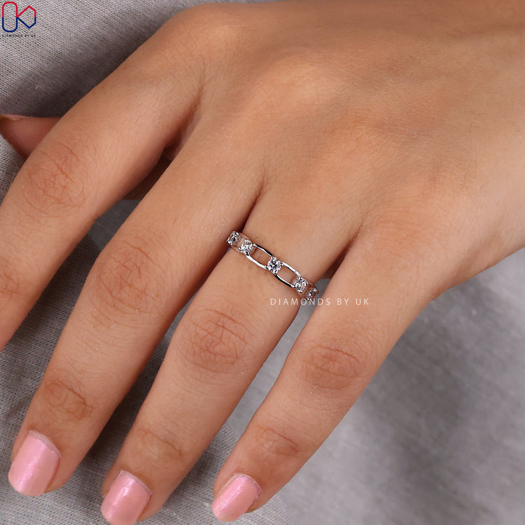 Handmade band styled with eternity diamond band accents.
