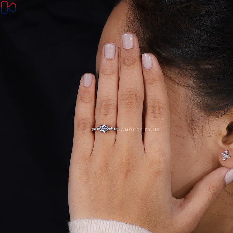 Customize ring with floating bubble prong and round diamond.
