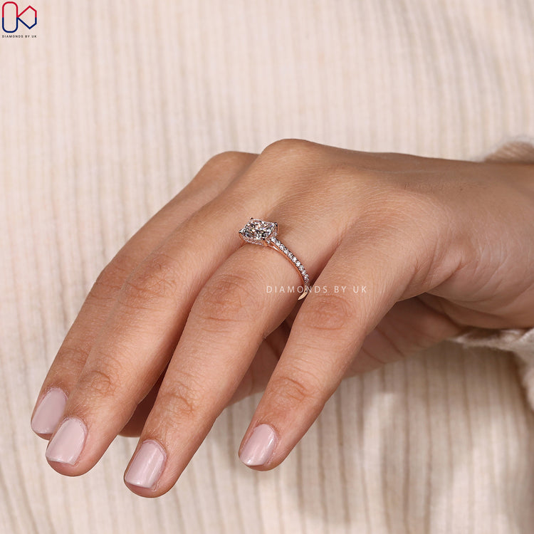 Pave ring setting with intricate diamond detailing.
