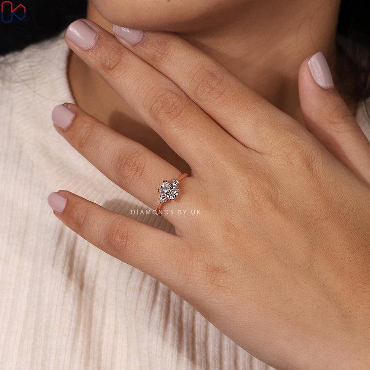 Cushion cut engagement ring with sparkling diamonds.
