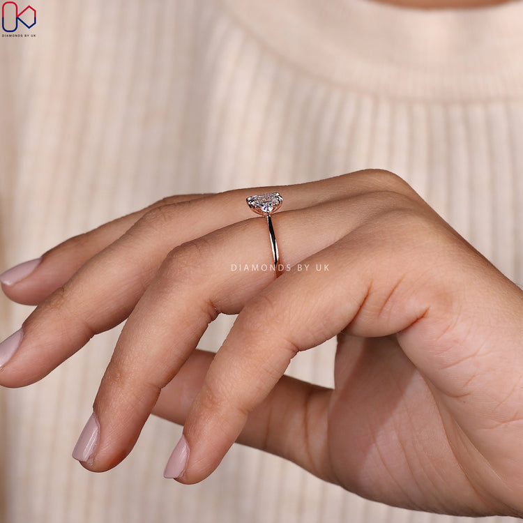 Double claw prong setting engagement ring for a secure fit.
