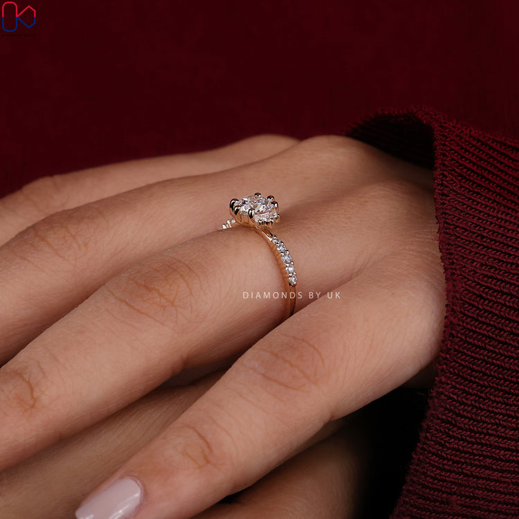 Yellow engagement ring with a beautiful, unique setting.
