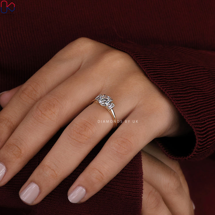 Yellow Gold ring with Diamondsbyuk engagement ring.
