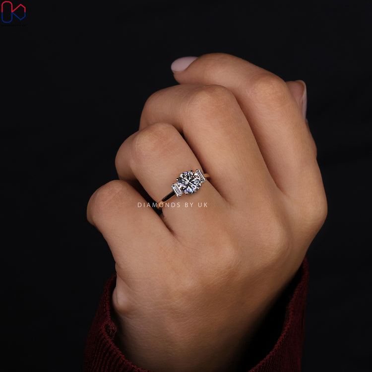 Round diamond engagement ring with handmade ring.
