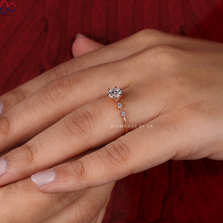 Handmade jewellery featuring a five stone diamond ring.
