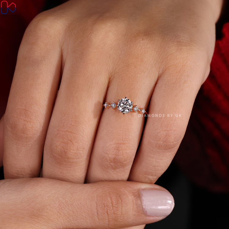 Diamondsbyuk engagement ring with a 6 prong setting.
