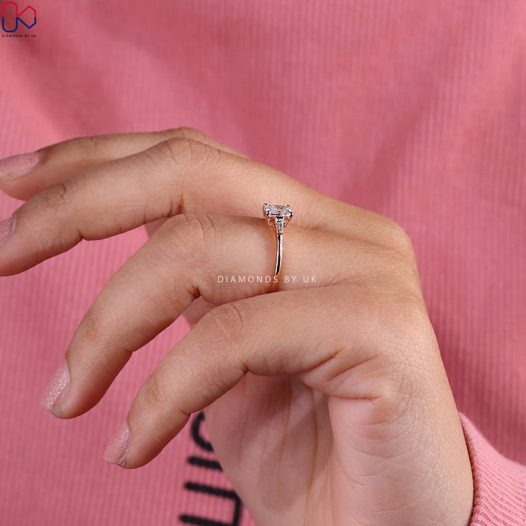 4 prong ring setting highlighting a radiant cut diamond.
