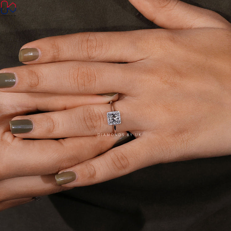 Buy engagement ring with Diamondsbyuk ring.
