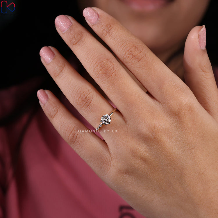 Handmade ring designed with a sparkling round diamond engagement ring.
