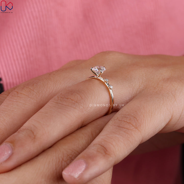 Elegant three prong setting showcasing a classic 3 Stone Engagement Ring.

