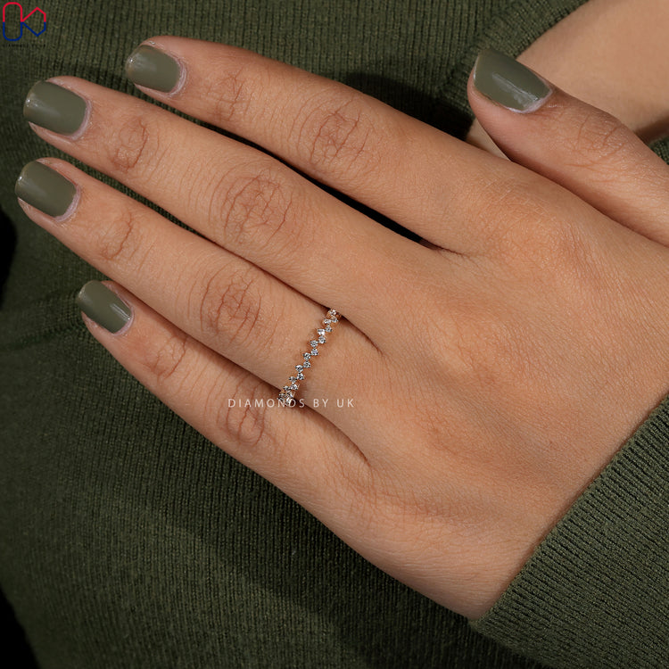 Stackable wedding band featuring a minimalist zig zag shape and clean profile.