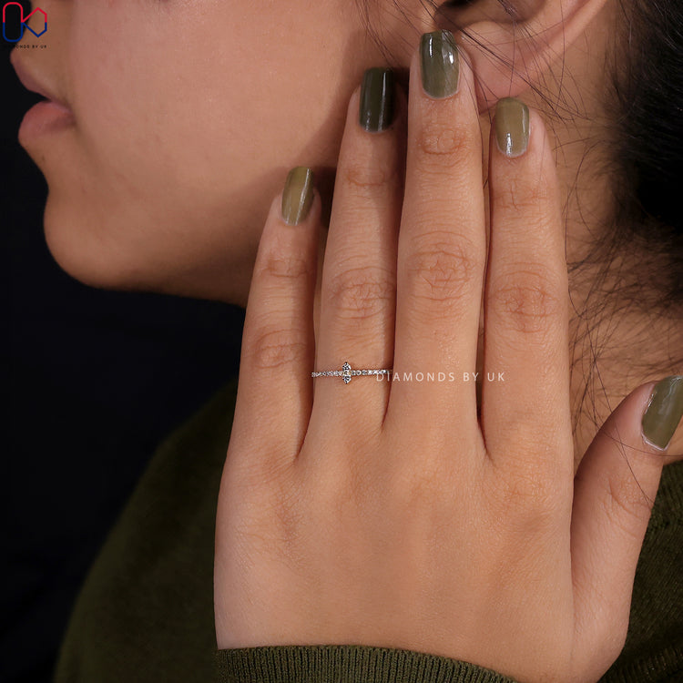 A pave wedding band adorned with tiny diamonds for a dazzling effect.
