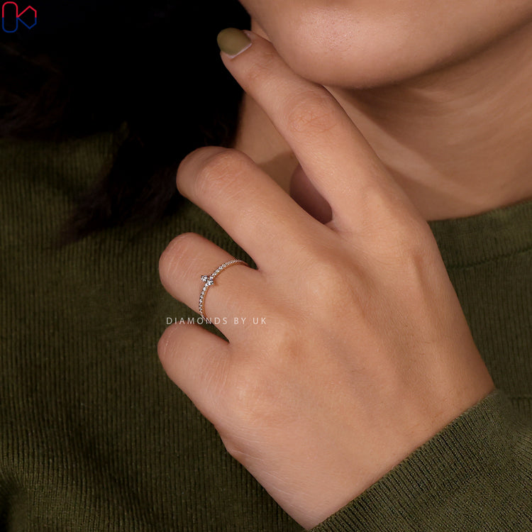 A half eternity wedding band showcasing stunning craftsmanship and sparkling diamonds.

