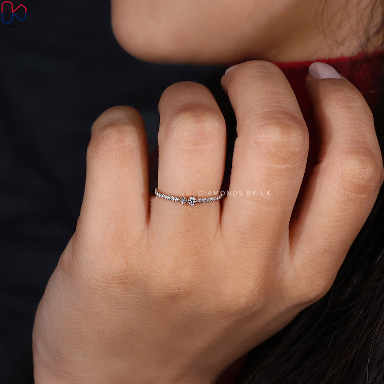 Buy diamond band crafted with round cut stones.
