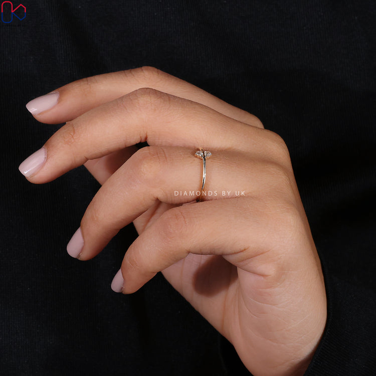 Yellow gold diamond ring with two stone setting.
