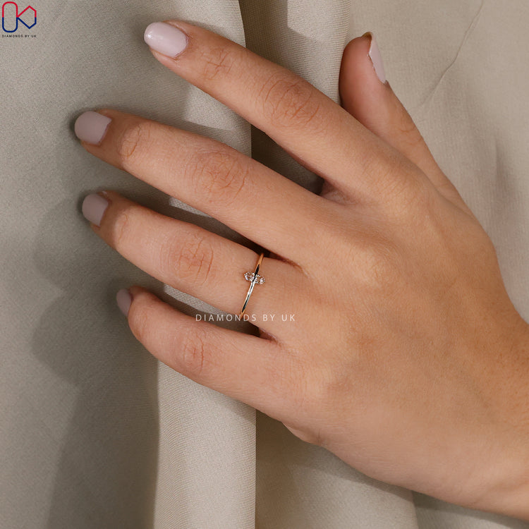 Diamondsbyuk three prong diamond ring with rose cut diamonds.
