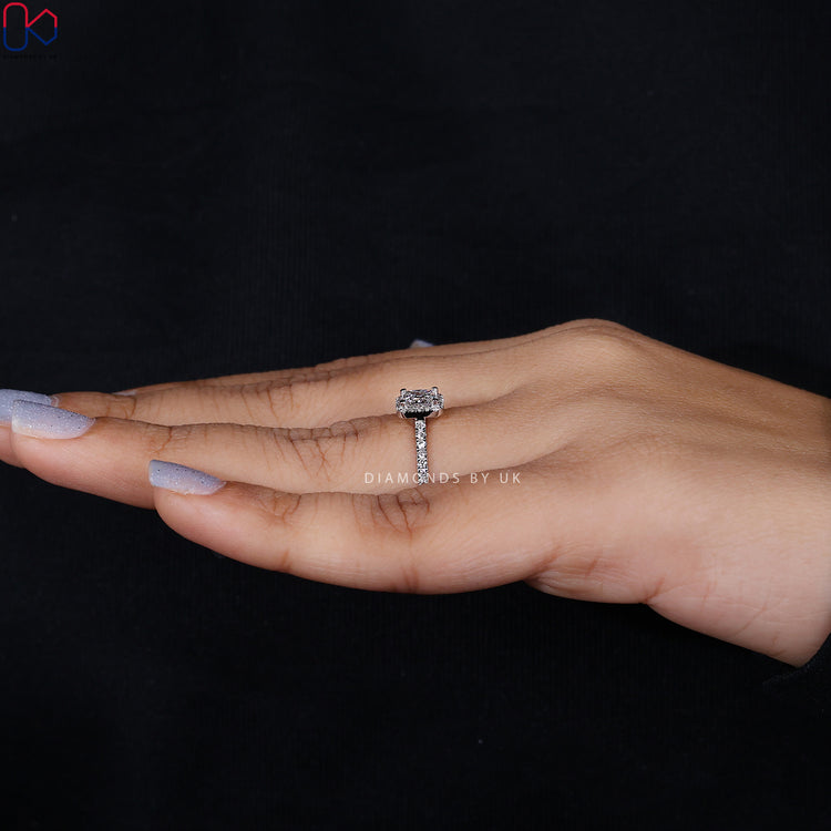 Diamondsbyuk ring with princess cut engagement ring.
