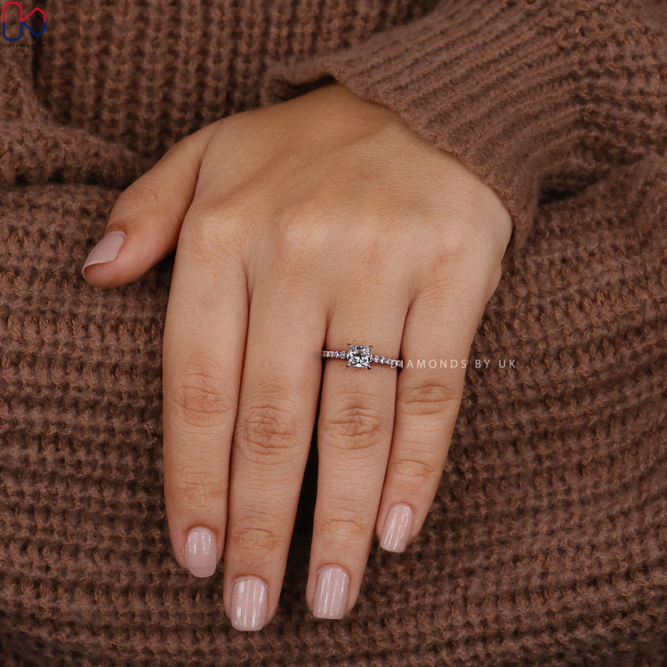 Pave setting princess diamond engagement ring.