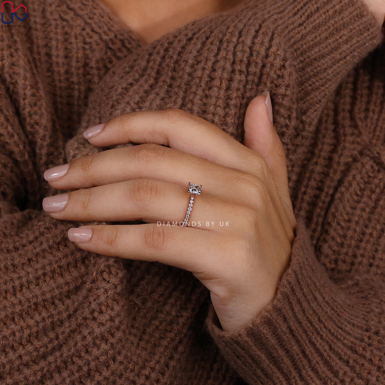 Custom rose gold engagement ring with pave diamonds.