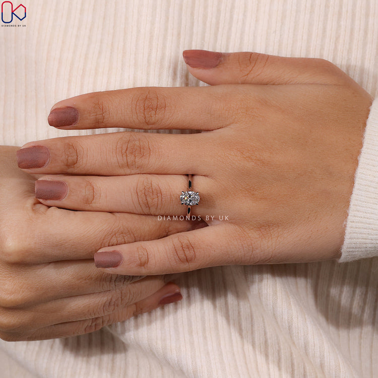 Diamondsbyuk engagement ring and Diamondsbyuk ring.
