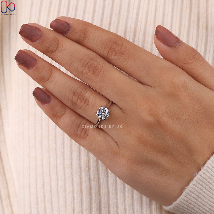 IGI certified round diamond for guaranteed quality and brilliance.
