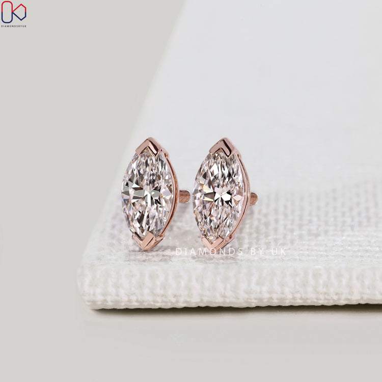 Lab grown marquise diamond solitaire earrings.