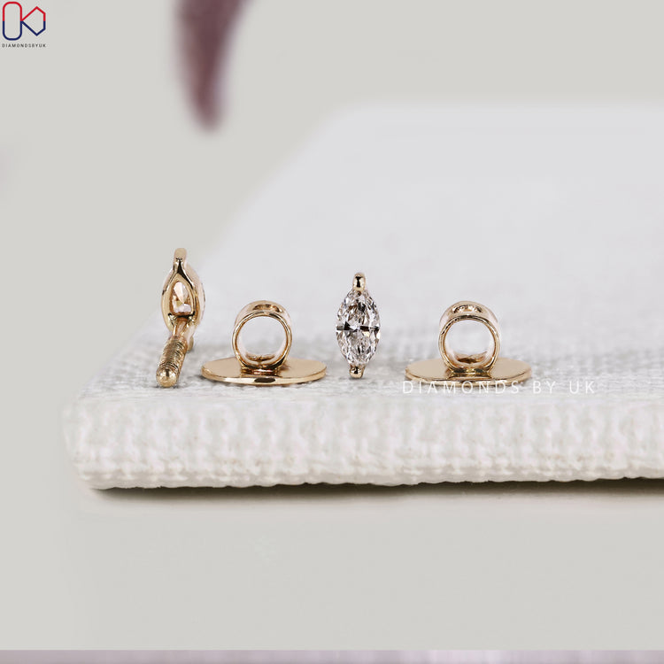 Lab grown marquise diamond earrings with prongs.