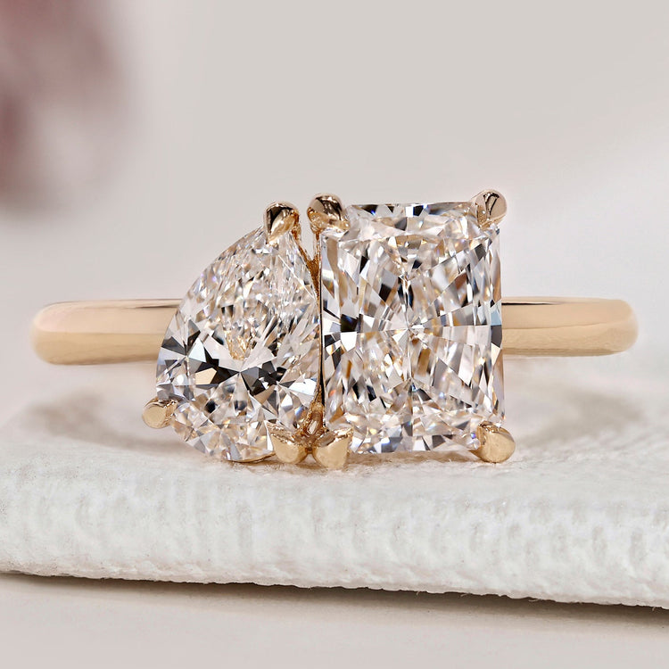 Toi et Moi ring with pear and radiant diamonds.