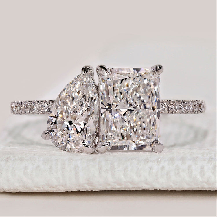 Toi et Moi ring with radiant and pear diamonds.