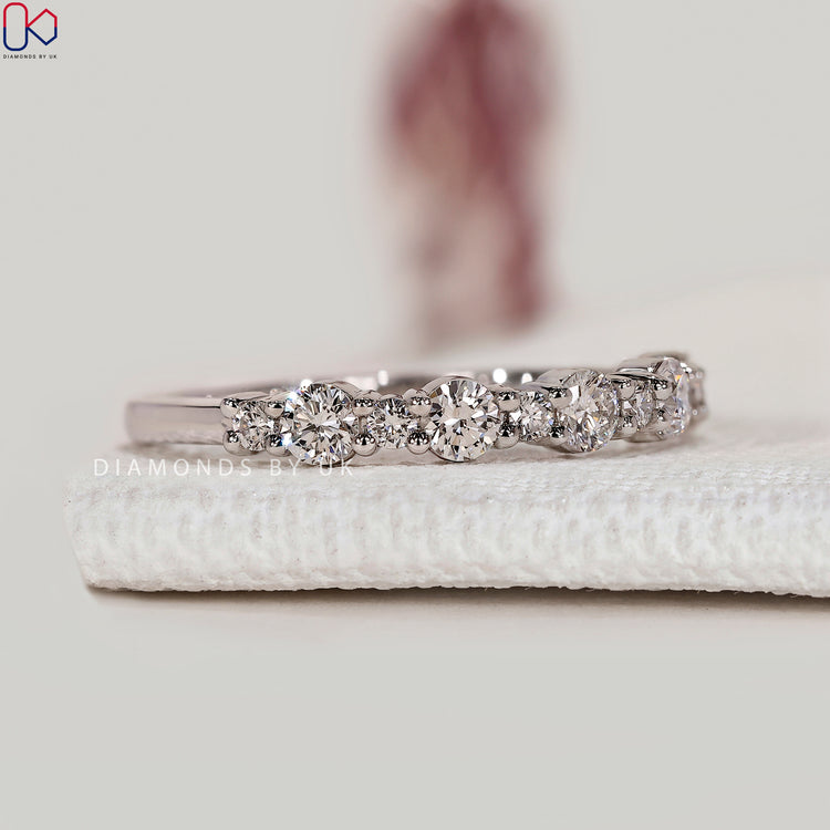 Handmade round cut diamond wedding band by Diamondsbyuk.