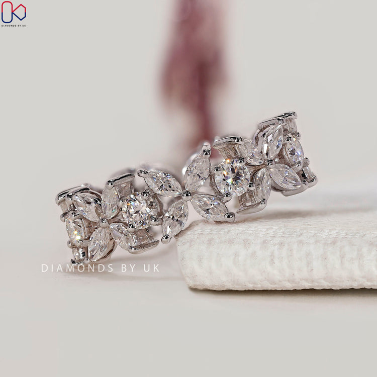 Round and marquise diamond band with floral eternity style.