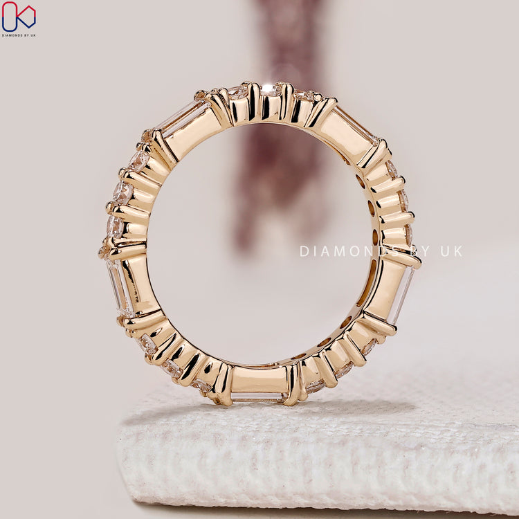 Baguette and round diamond band with full eternity style.