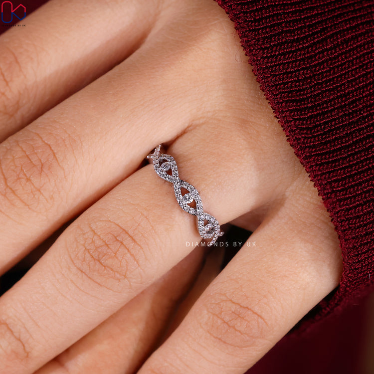 Handmade round diamond half eternity wedding band.
