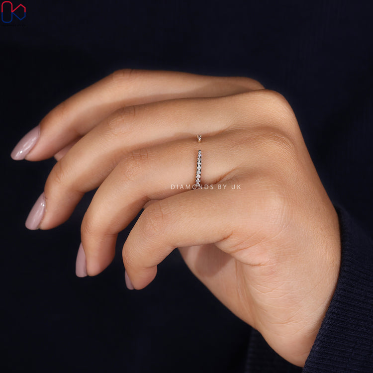 Handmade round diamond wedding band with open gap style.