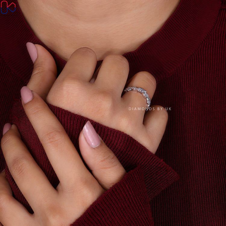 Handmade round cut wedding band with half eternity style.