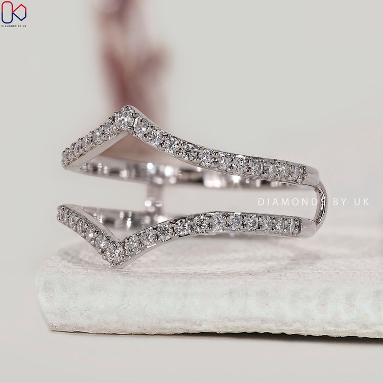 Ring enhancer wedding band designed in white gold with round cut lab grown diamonds.
