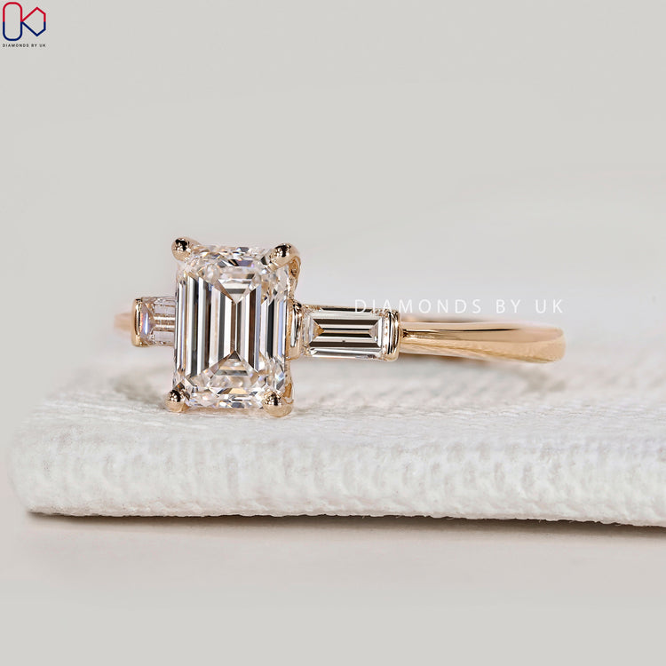 IGI Certified emerald cut ring with cathedral style.