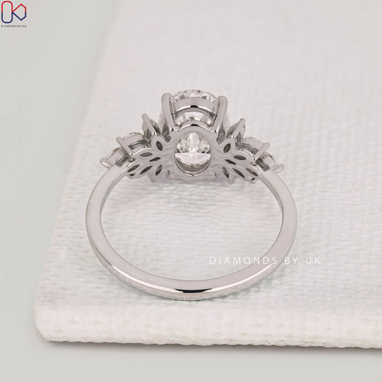 Handmade oval engagement ring with prong setting.
