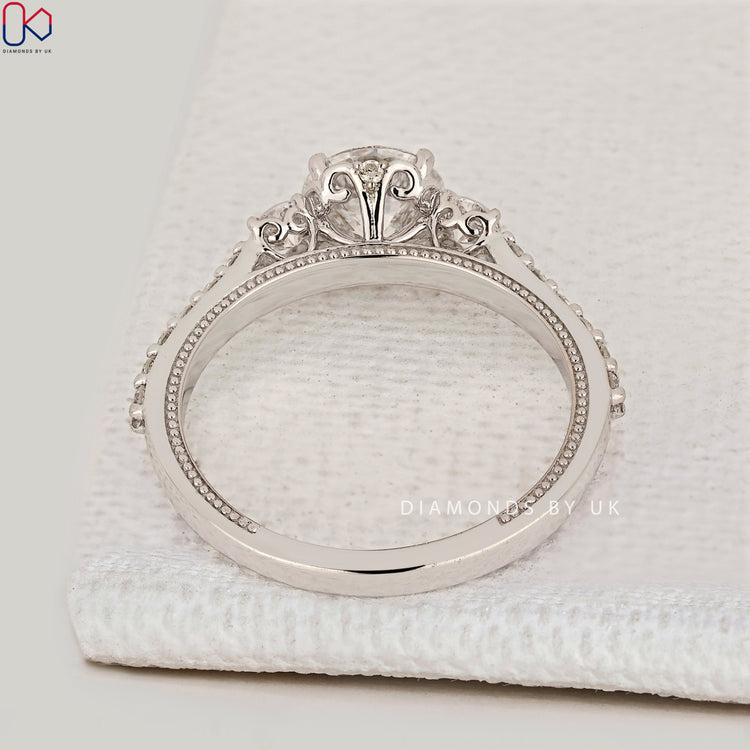 IGI Certified round diamond three stone ring.