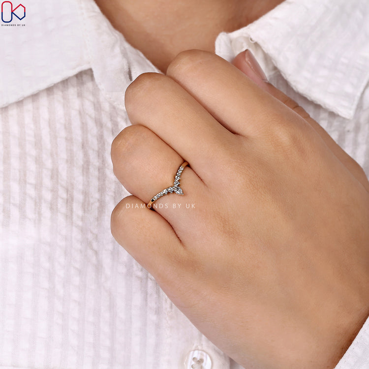 Handmade diamond wedding band with curved chevron style.
