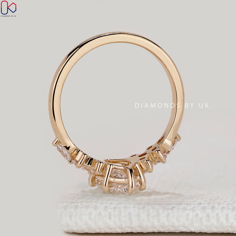 IGI Certified marquise diamond ring with side stones.
