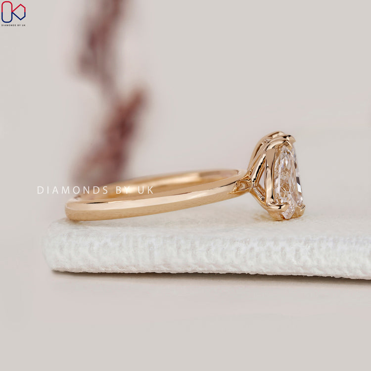Handmade pear and radiant diamond Toi et Moi ring.