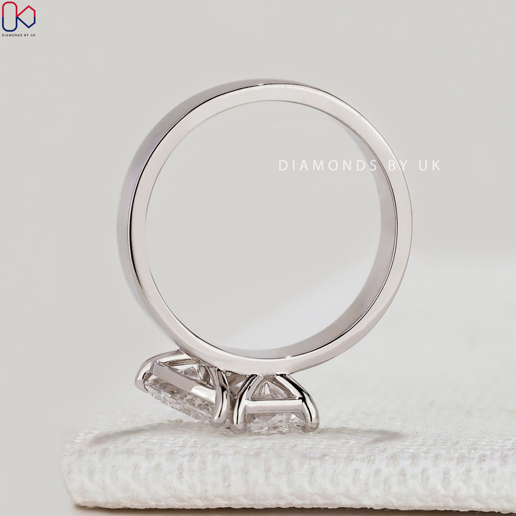 Toi et Moi ring with radiant and pear diamonds.
