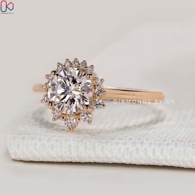 Round lab grown diamond ring with cathedral setting.
