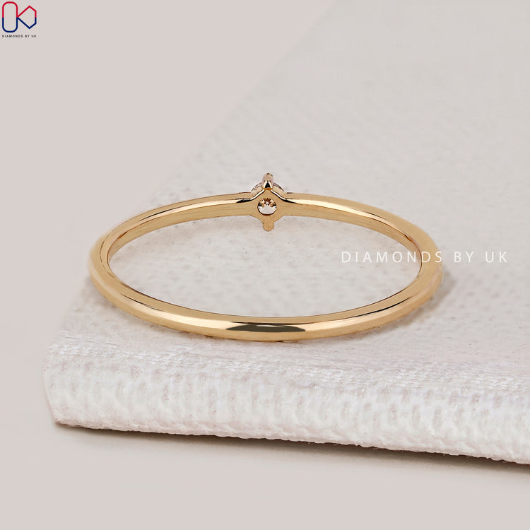 Handmade round diamond wedding band with solitaire style.
