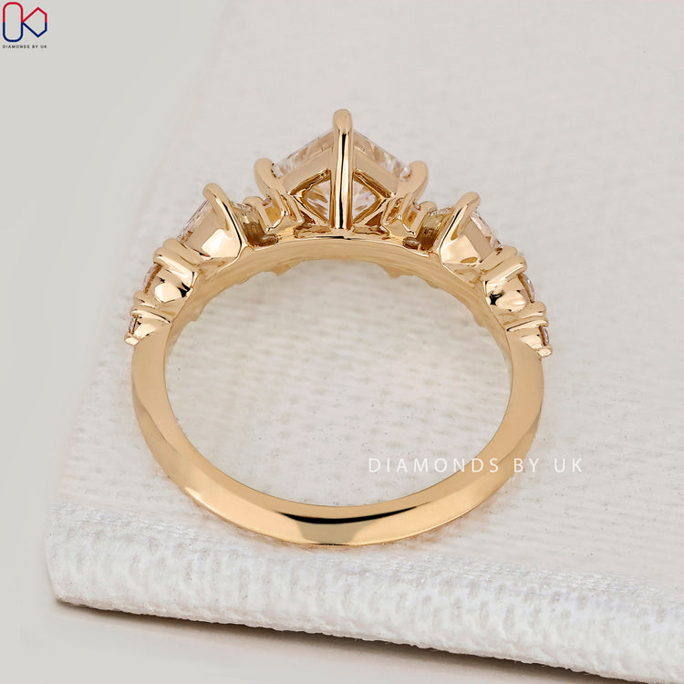 IGI Certified princess cut diamond ring with cluster.