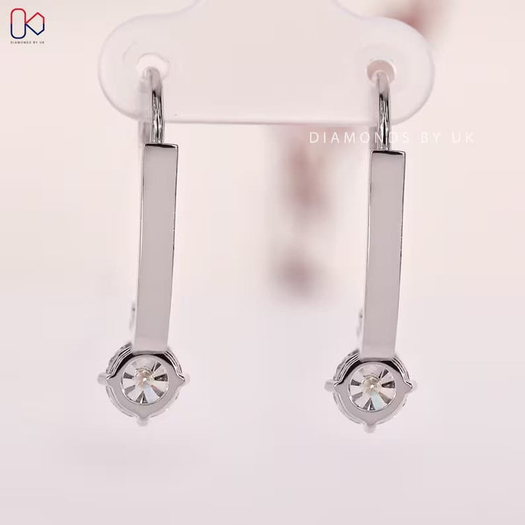 Handmade round diamond drop earrings by Diamondsbyuk.