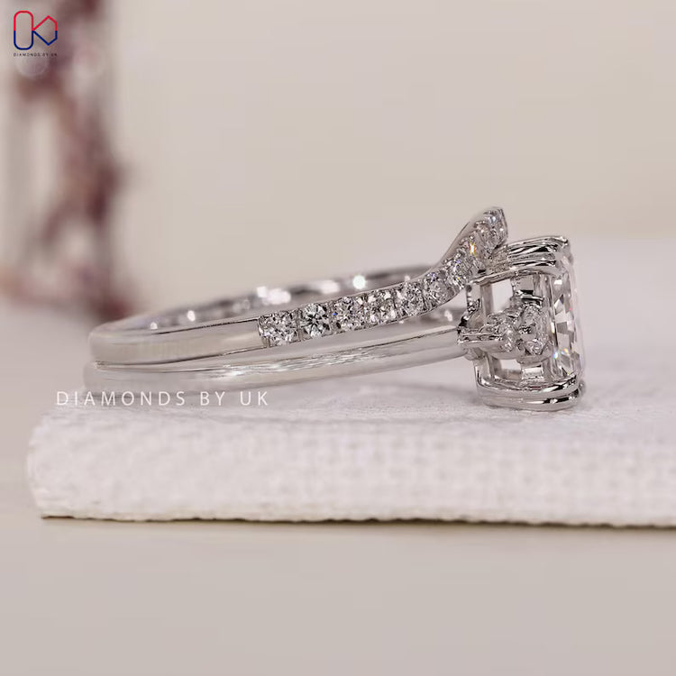 Lab grown radiant ring with round diamond half eternity band.