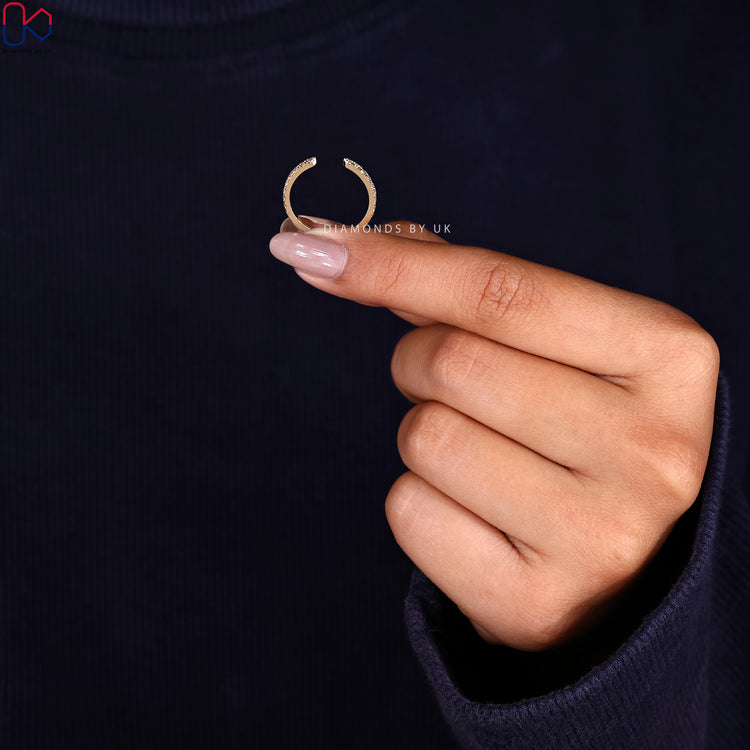 Buy diamond band with round diamonds, set in yellow gold for style.