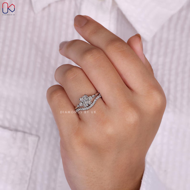 Lab grown diamond engagement ring with curved round band.